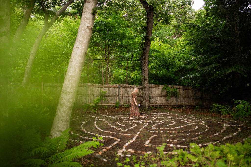 women walking in labyrinth, designed to be a place of personal, psychological, and spiritual healing.